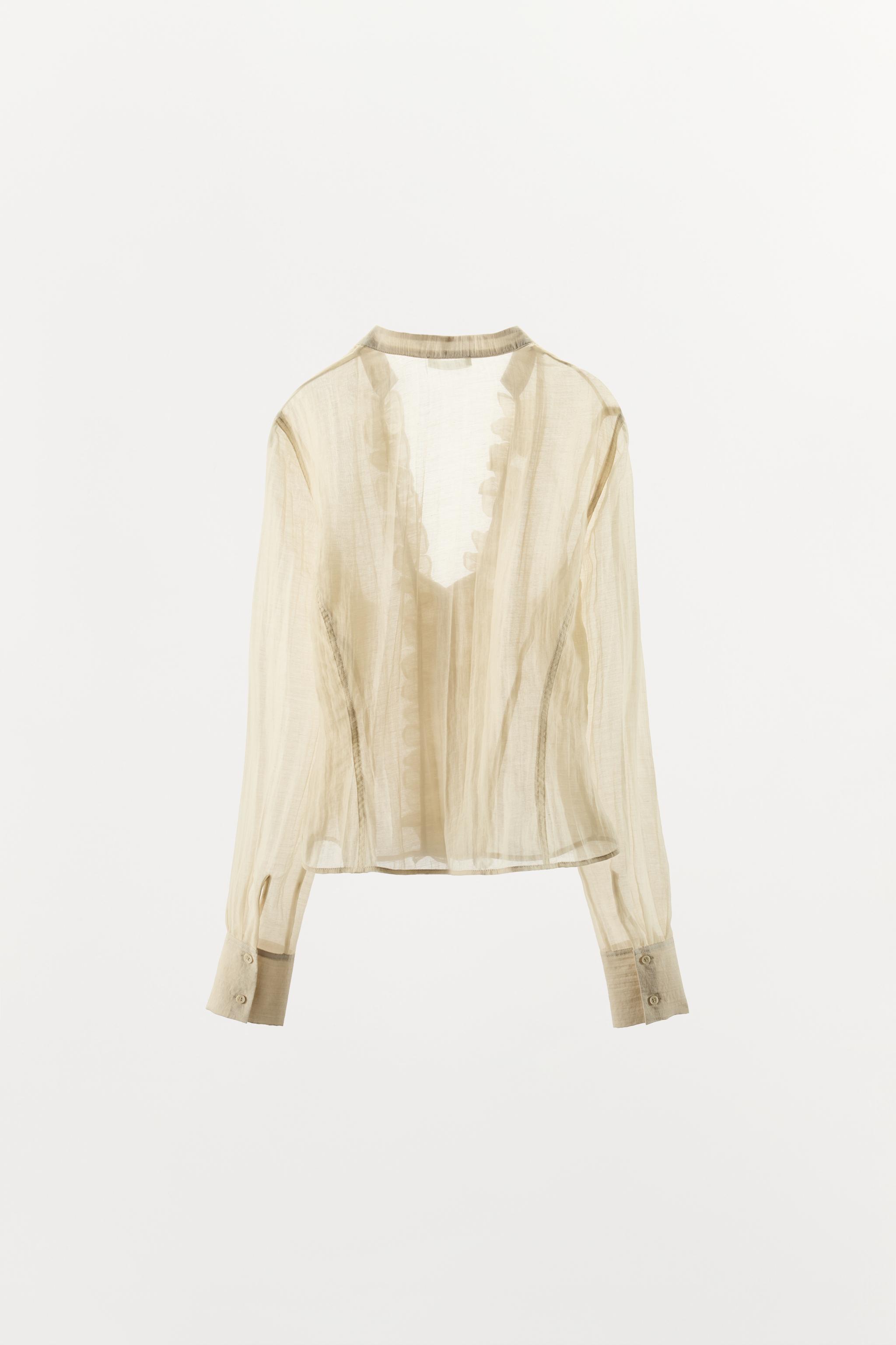 BLOUSE À VOLANTS